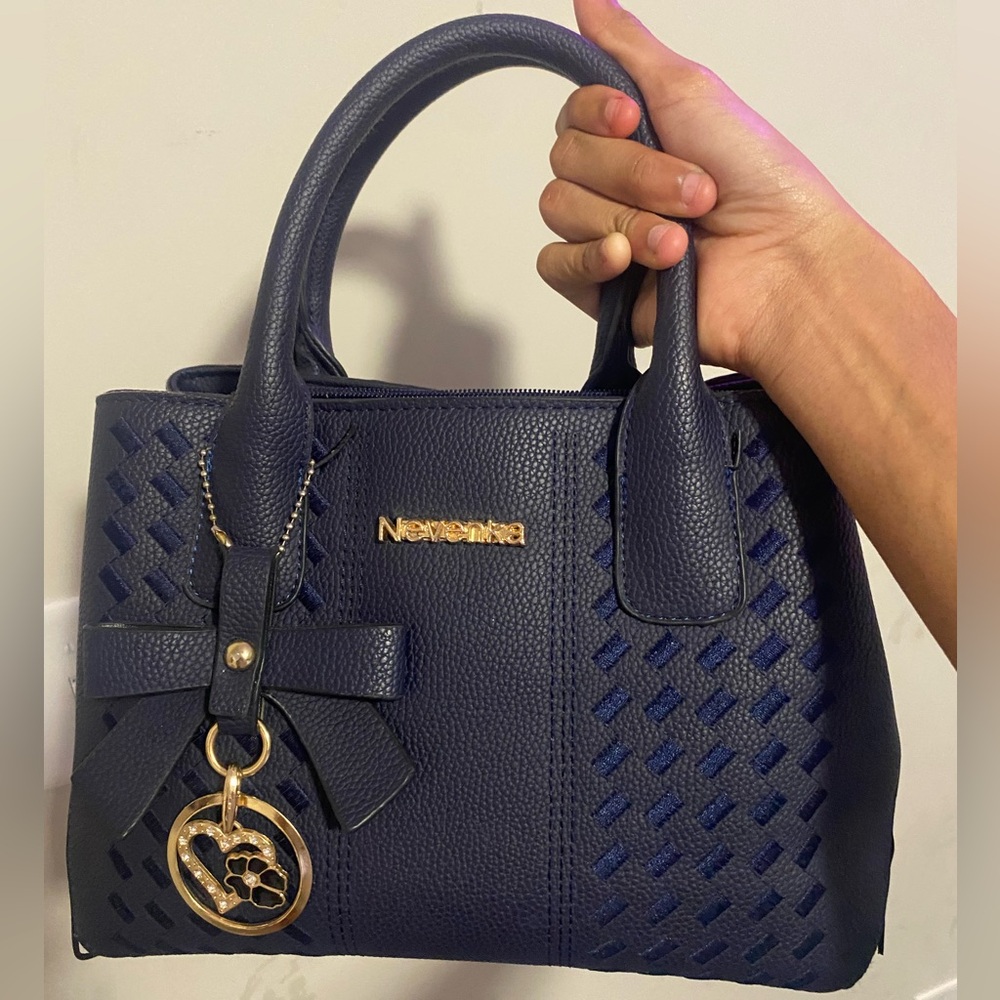 Blue bag that I only wear a couple of times 
Mid size